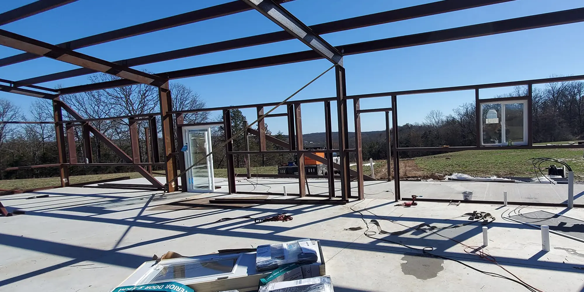 This image shows the iron framework of a large fabricated building.